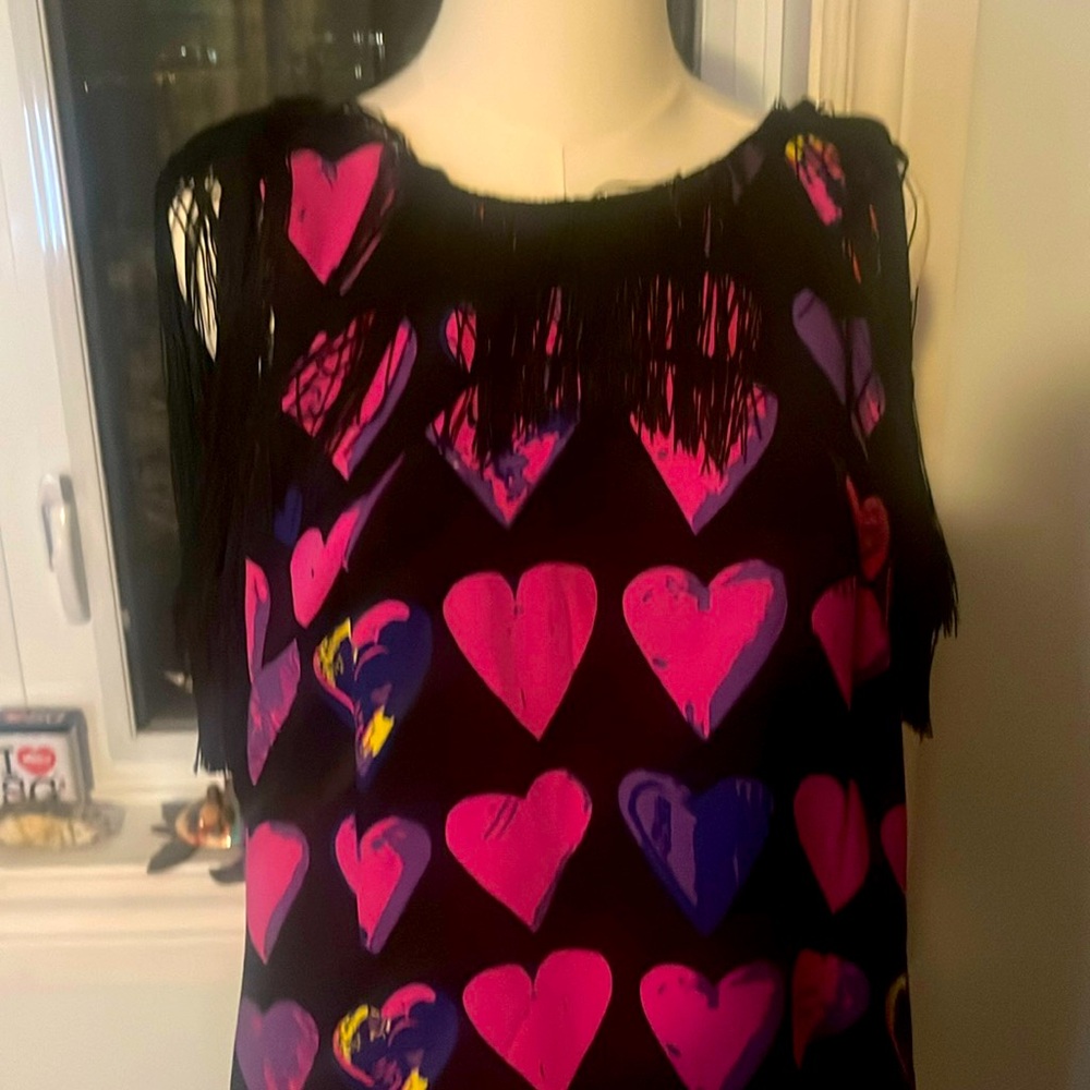 Versace by H&M dress size 8 beautiful fun and playful. Size 8 fits a comfortable